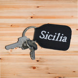 Sicilia Keychain - Black Embroidered with Flag on Back - SALE