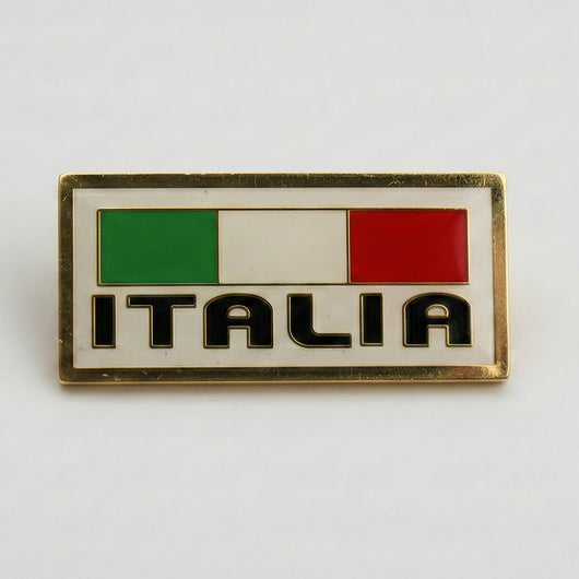 Pin with Italian flag design and 'ITALIA' text on a white background