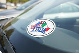 Sticker with Italian, American, and Mexican flags on a car window