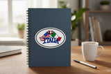 Notebook with 'USA vs Italia' design on a desk with a cup of coffee and pen.