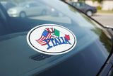 Car sticker with 'U.S. vs Italia' text and flags on a car window.