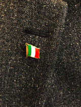 Metal lapel pin shaped like a waving Italian flag with vertical stripes in green, white, and red. Gold-colored edges and flagpole add elegance, while the 1"x5" size and secure metal clasp make it ideal for jackets, hats, or bags. A stylish symbol of Italian pride and heritage.